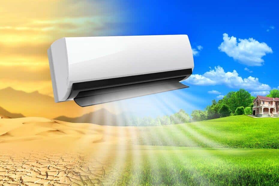 A ductless unit with a desert on one side of it and green grass and a house on the other side