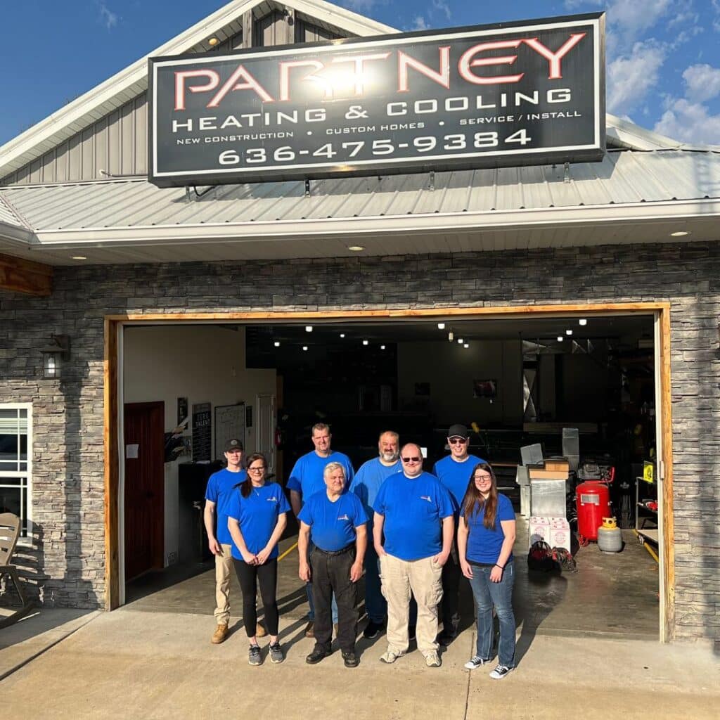 Partney Heating and Cooling Crew and Building