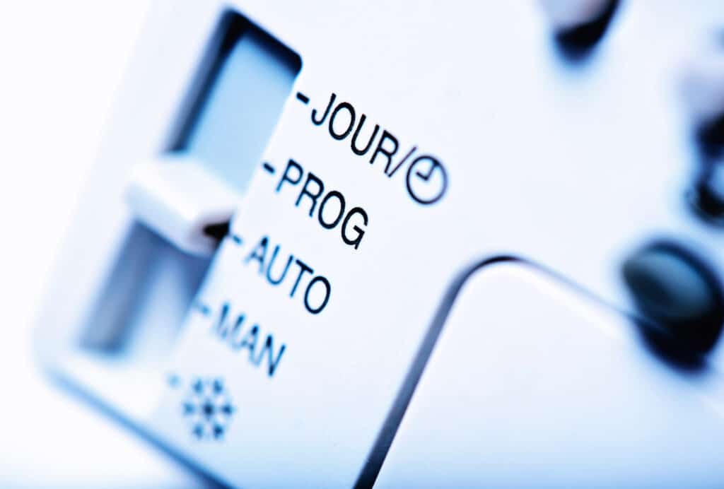 A Closeup of a Programmable Thermostat